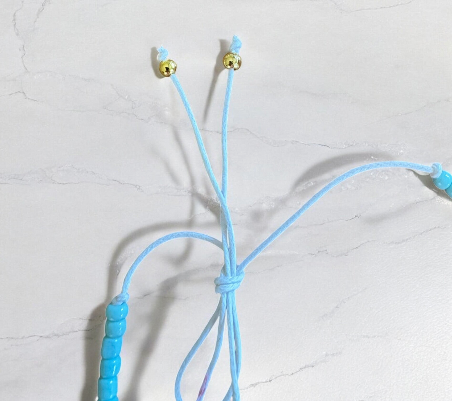 Halskette mit kleinem Sternanhänger.