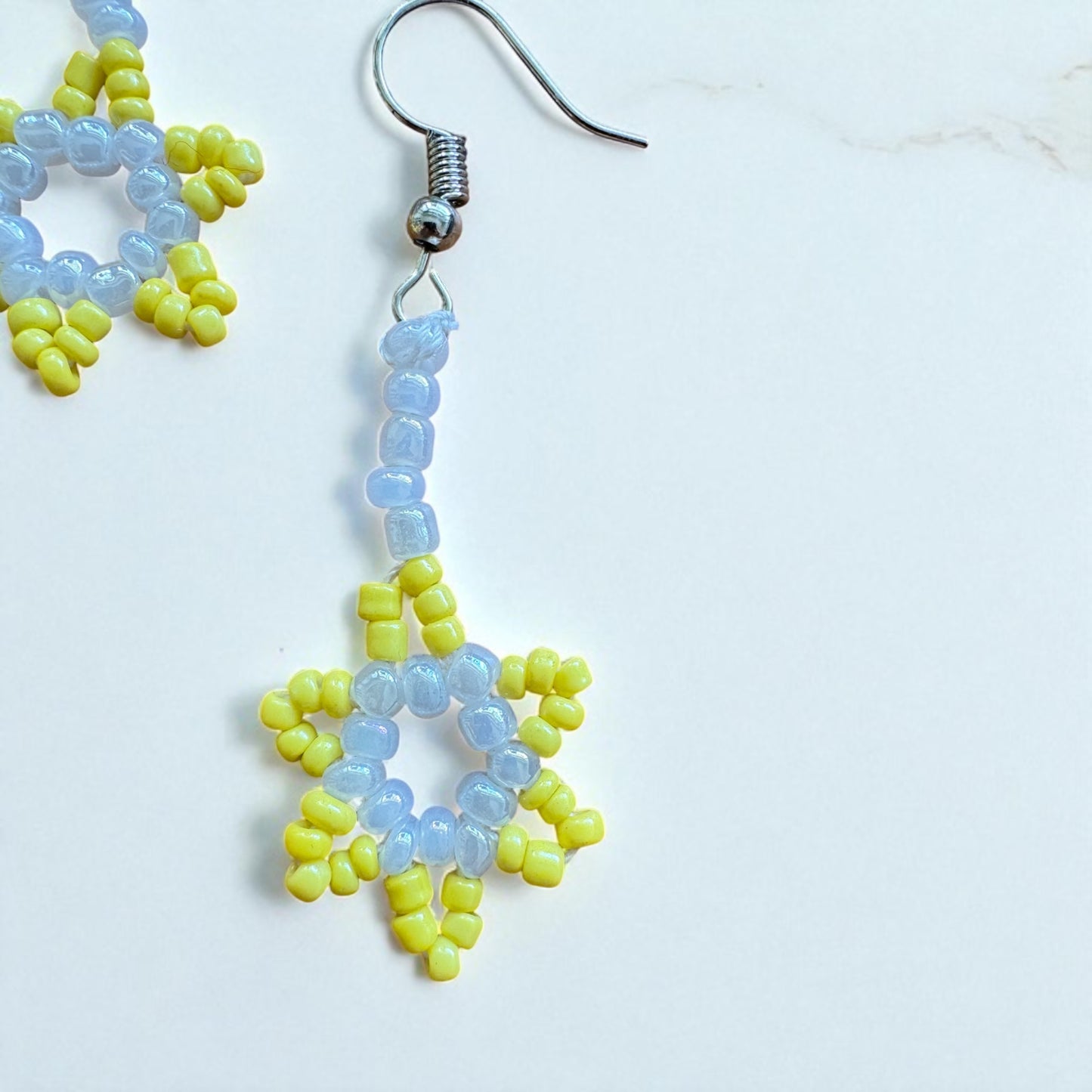 Gelbe Perlen als Stern Ohrringe