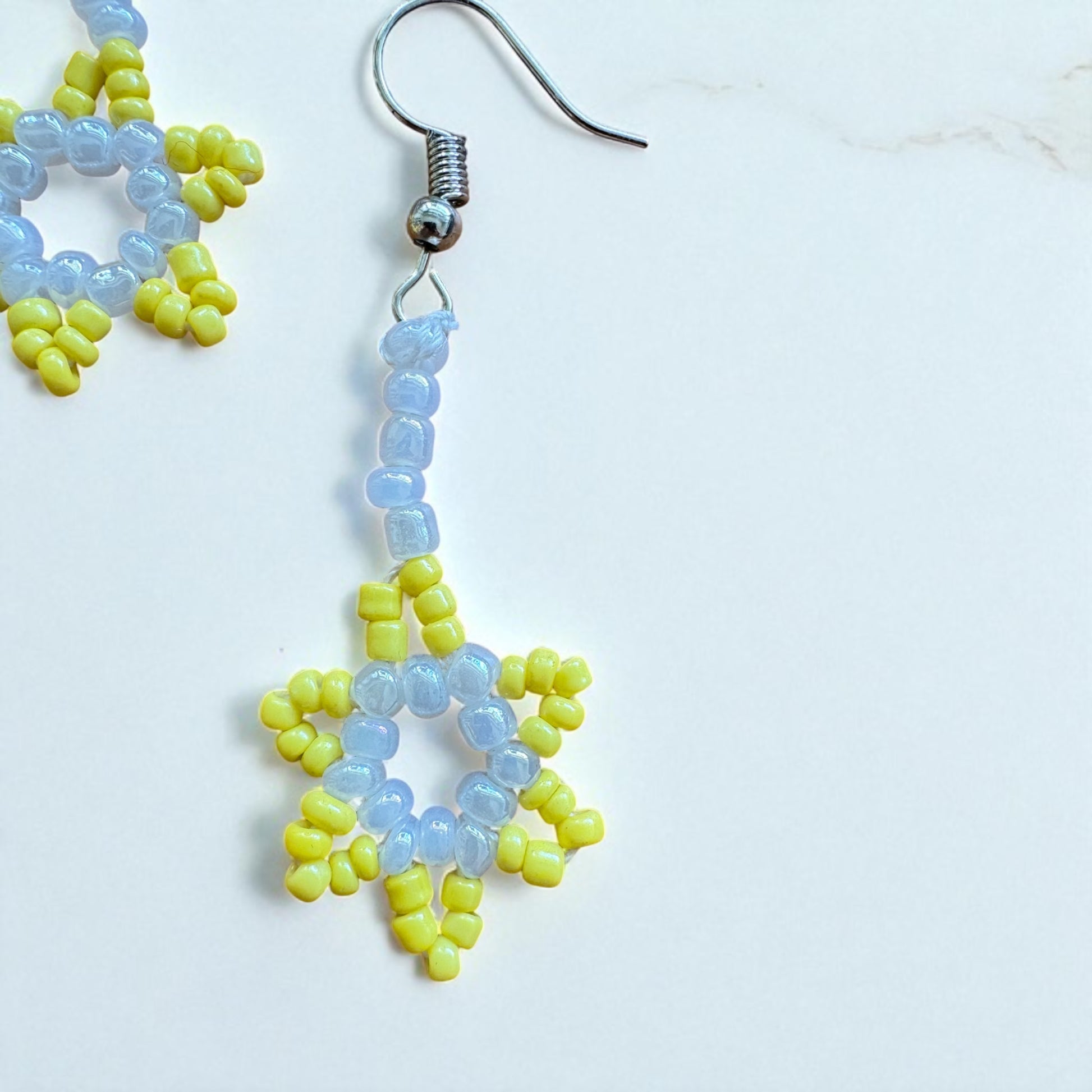 Gelbe Perlen als Stern Ohrringe